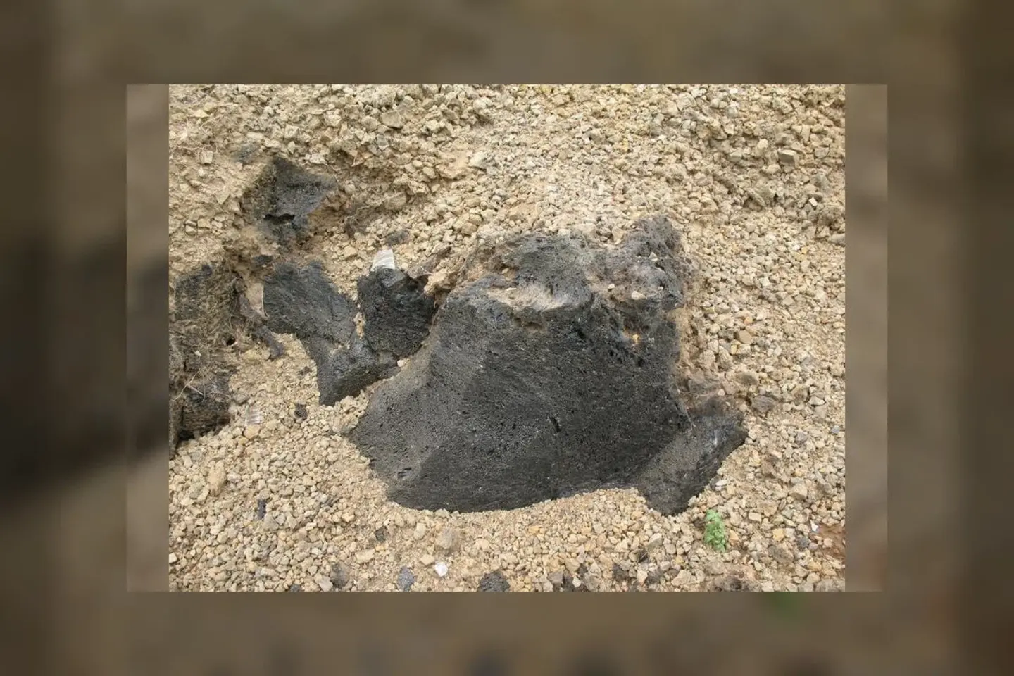 Commons identifies volcanic material at Menengai Crater; it is geology context and not evidence of the road surface.