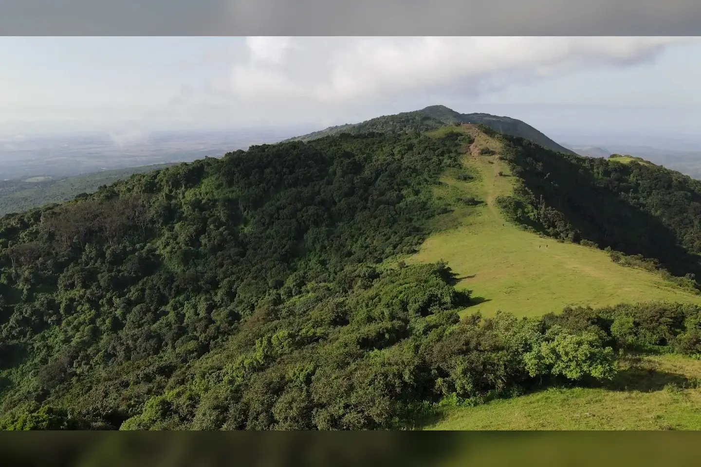Commons identifies the first of the Ngong Hills; it is landmark context, not a turn instruction.